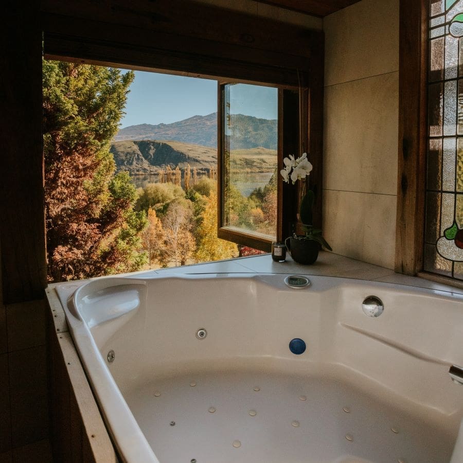 Cottage - jacuzzi bath window view - portrait (AIC - April 2022) - square - resized